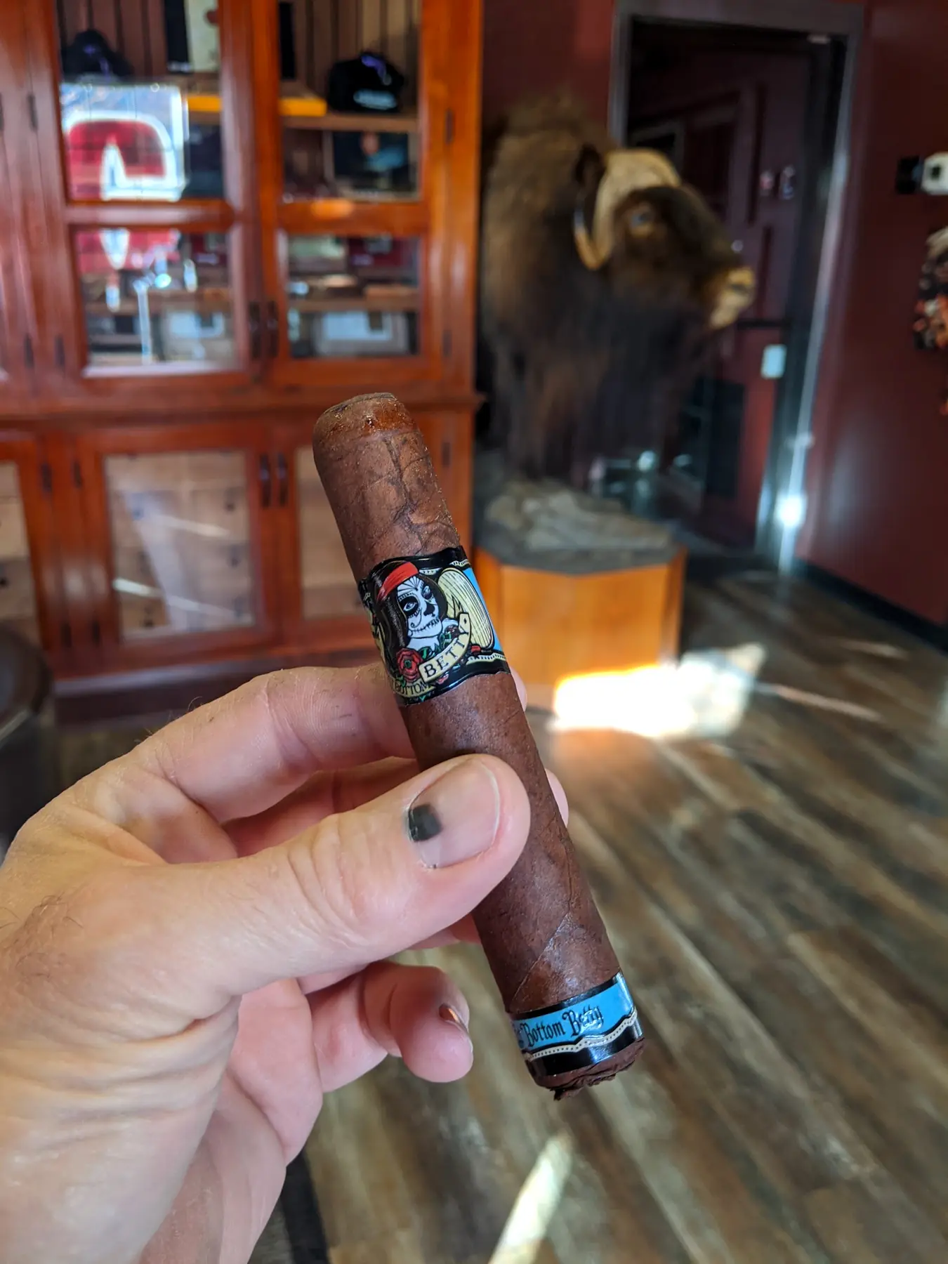 Choosing a cigar in the humidor